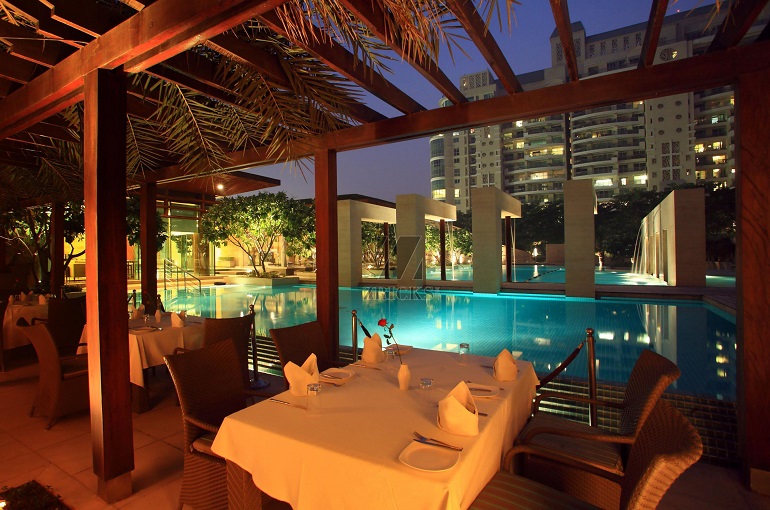 Poolside dining at DLF The Aralias