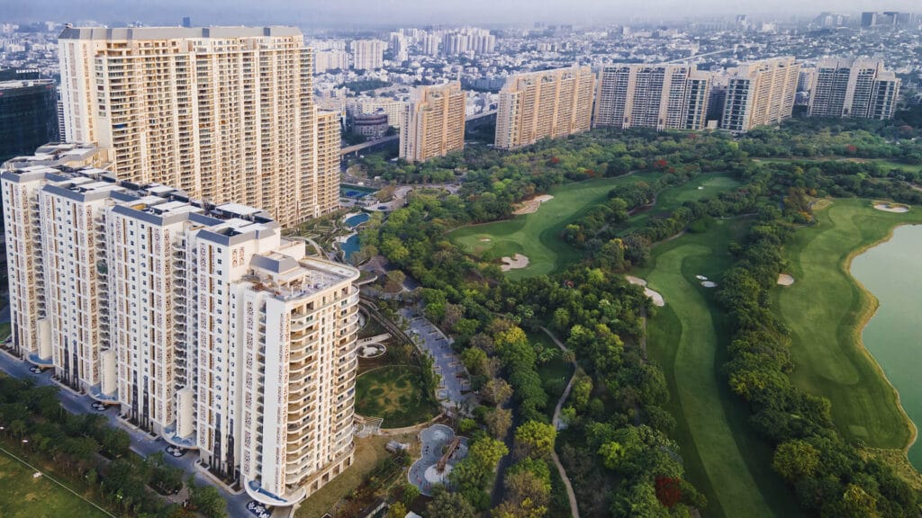 Aerial view of DLF The Magnolias beside the golf course